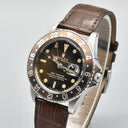 ROLEX GMT MASTER REF. 1675 GILT TROPICAL STAINLESS STEEL