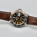 ROLEX GMT MASTER REF. 1675 GILT TROPICAL STAINLESS STEEL