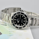 ROLEX SUBMARINER REF. 14060M STAINLESS STEEL BOX AND PAPERS