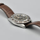 ROLEX GMT MASTER REF. 1675 GILT TROPICAL STAINLESS STEEL