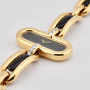 BOUCHERON LADY'S YELLOW GOLD AND ONYX