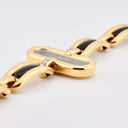 BOUCHERON LADY'S YELLOW GOLD AND ONYX