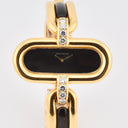 BOUCHERON LADY'S YELLOW GOLD AND ONYX
