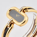 BOUCHERON LADY'S YELLOW GOLD AND ONYX