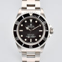 ROLEX SUBMARINER REF. 14060M 4 LINES STAINLESS STEEL BOX AND PAPERS