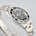ROLEX SUBMARINER REF. 14060M 4 LINES STAINLESS STEEL BOX AND PAPERS