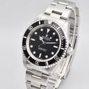 ROLEX SUBMARINER REF. 14060 STAINLESS STEEL BOX AND PAPERS