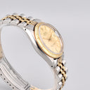 ROLEX OYSTER DATE 31 REF. 6827 LINEN DIAL STAINLESS STEEL AND GOLD