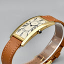 CARTIER TANK CINTREE YELLOW GOLD