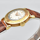 PATEK PHILIPPE WORLD TIME REF. 1415 YELLOW GOLD WITH EXTRACT FROM THE ARCHIVES