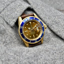 ROLEX SUBMARINER REF. 1680 COLOR CHANGE DIAL YELLOW GOLD